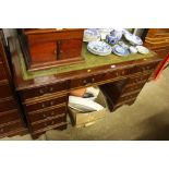 A reproduction mahogany twin pedestal writing desk