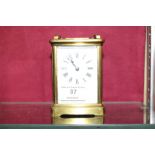 A brass cased carriage clock