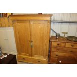 A 19th Century stripped pine knock down wardrobe -