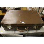 Three brown leather cases