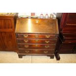 A George III mahogany four drawer bureau