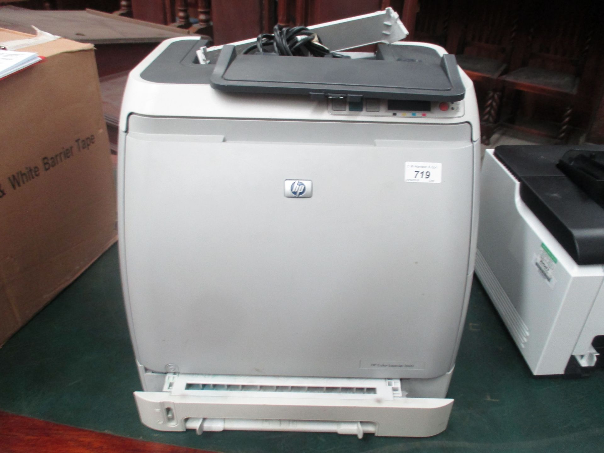 An HP 1600 colour laser jet printer with power lead