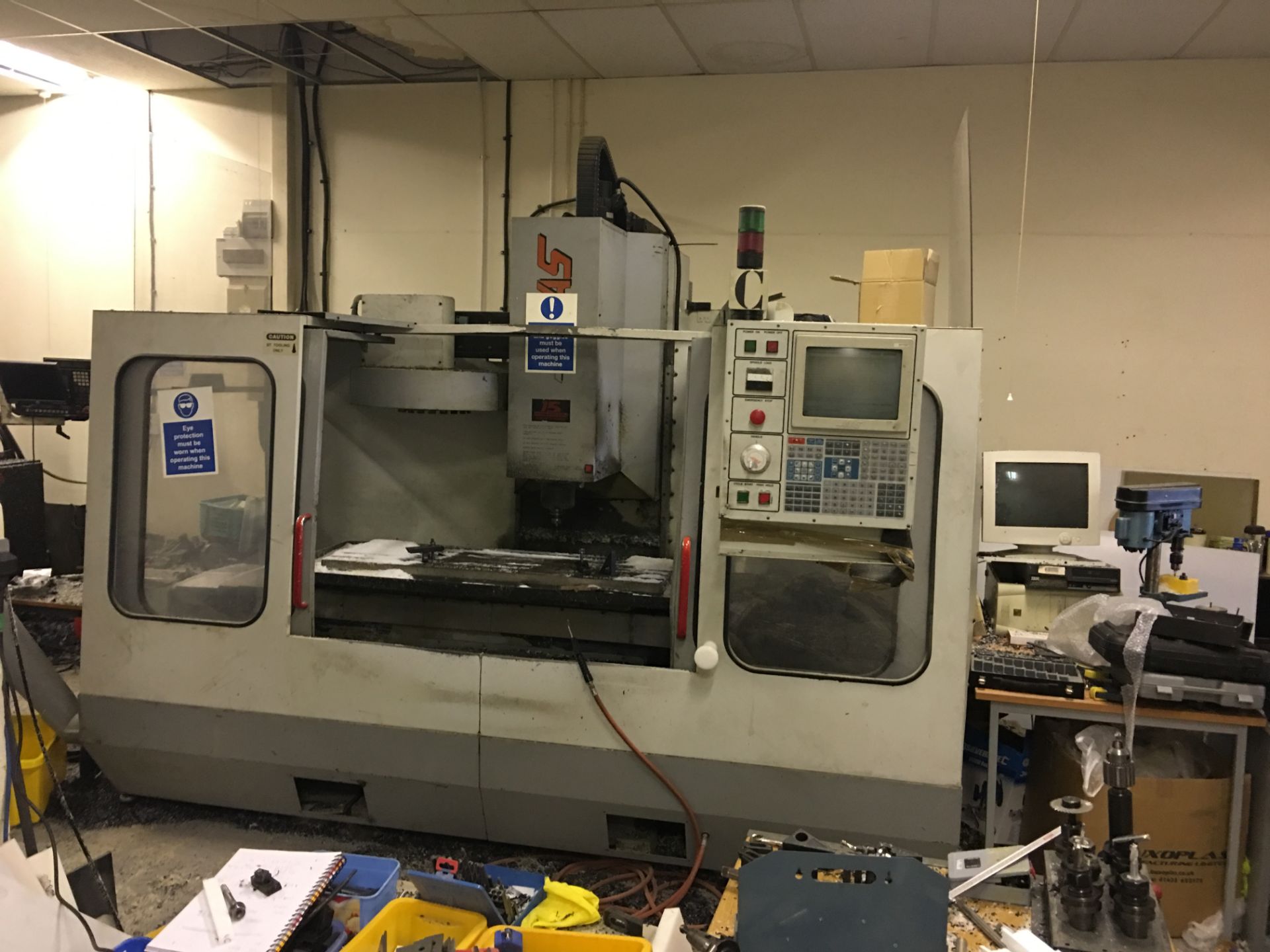 HAAS MODEL 4 MILLING MACHINE, controller and tooling.