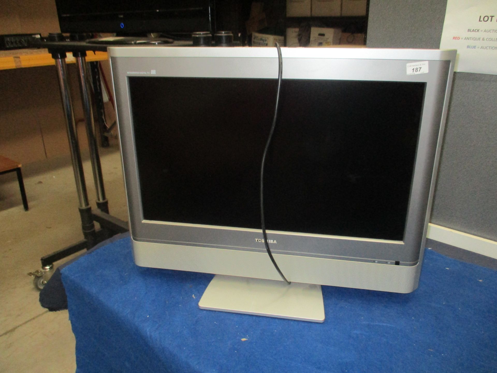 A Toshiba 27WLT56B 27" integrated digital HD TV complete with power lead - no remote control