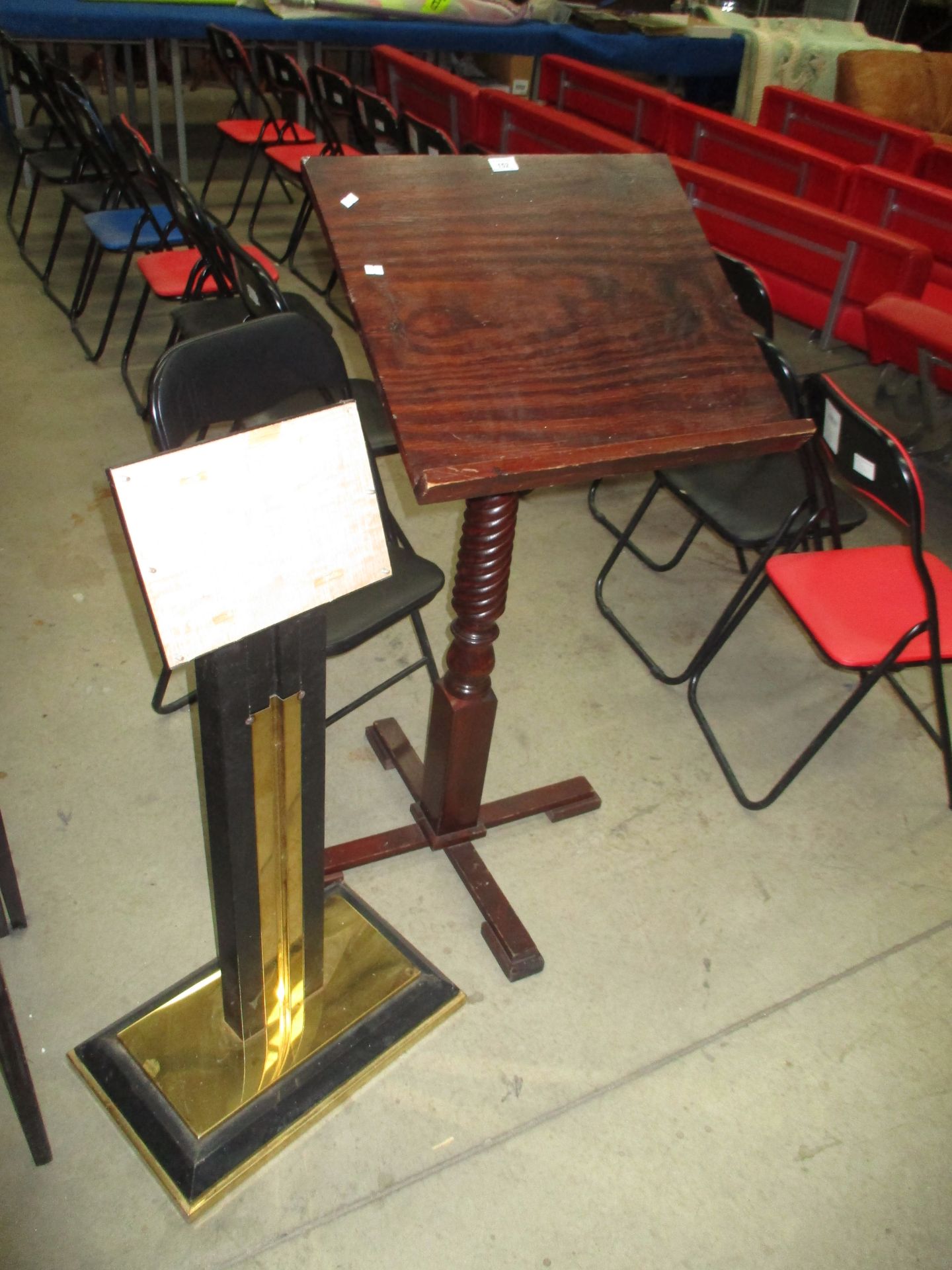 A mahogany finish head waiters menu stand and one other