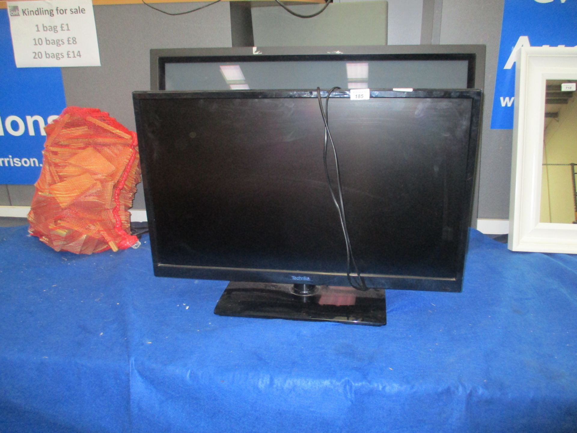 A Technika LED 32-E251 32" LCD TV complete with remote control