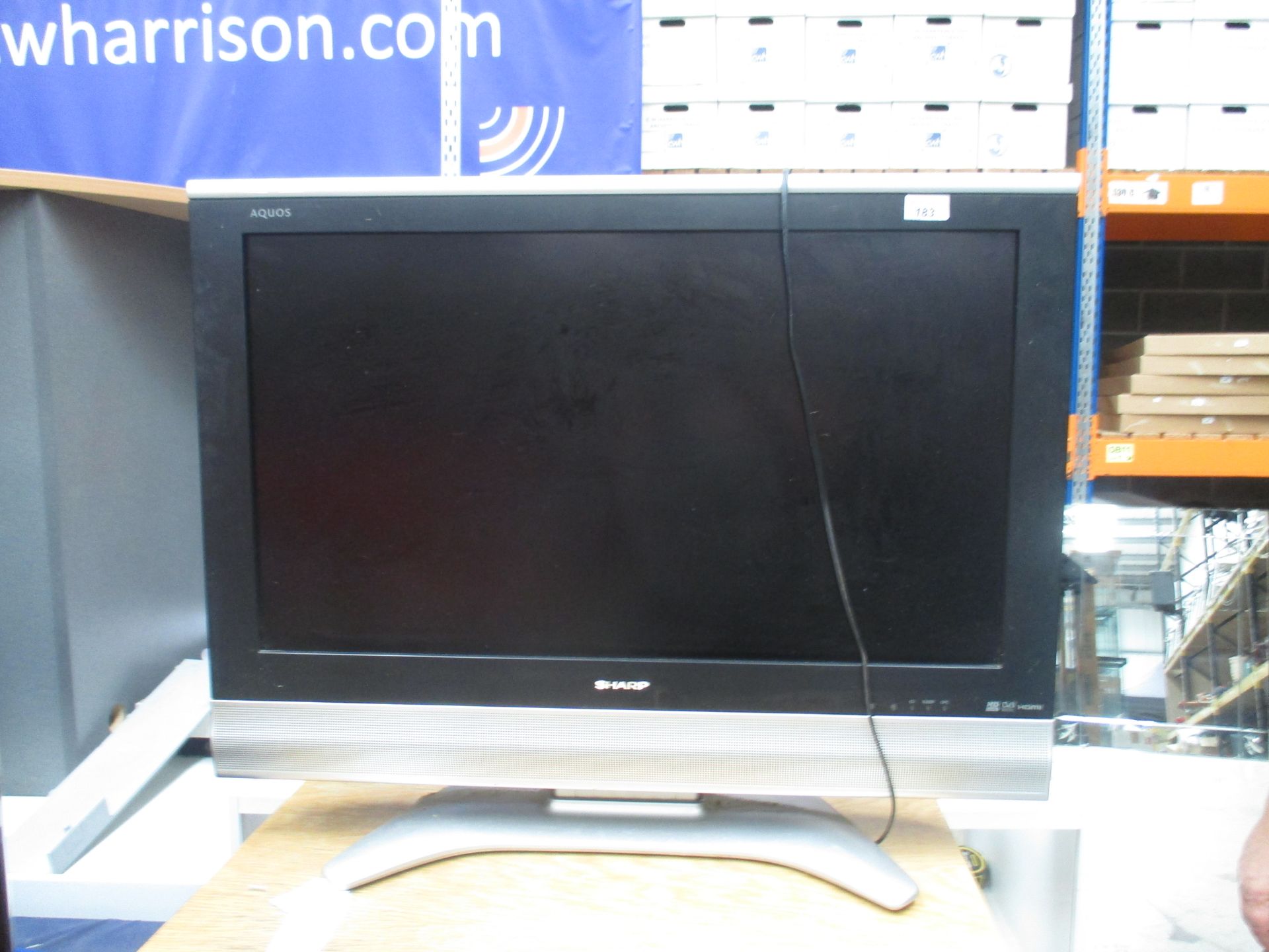 A Sharp LC-32GD8EA 32" LCD TV complete with remote control