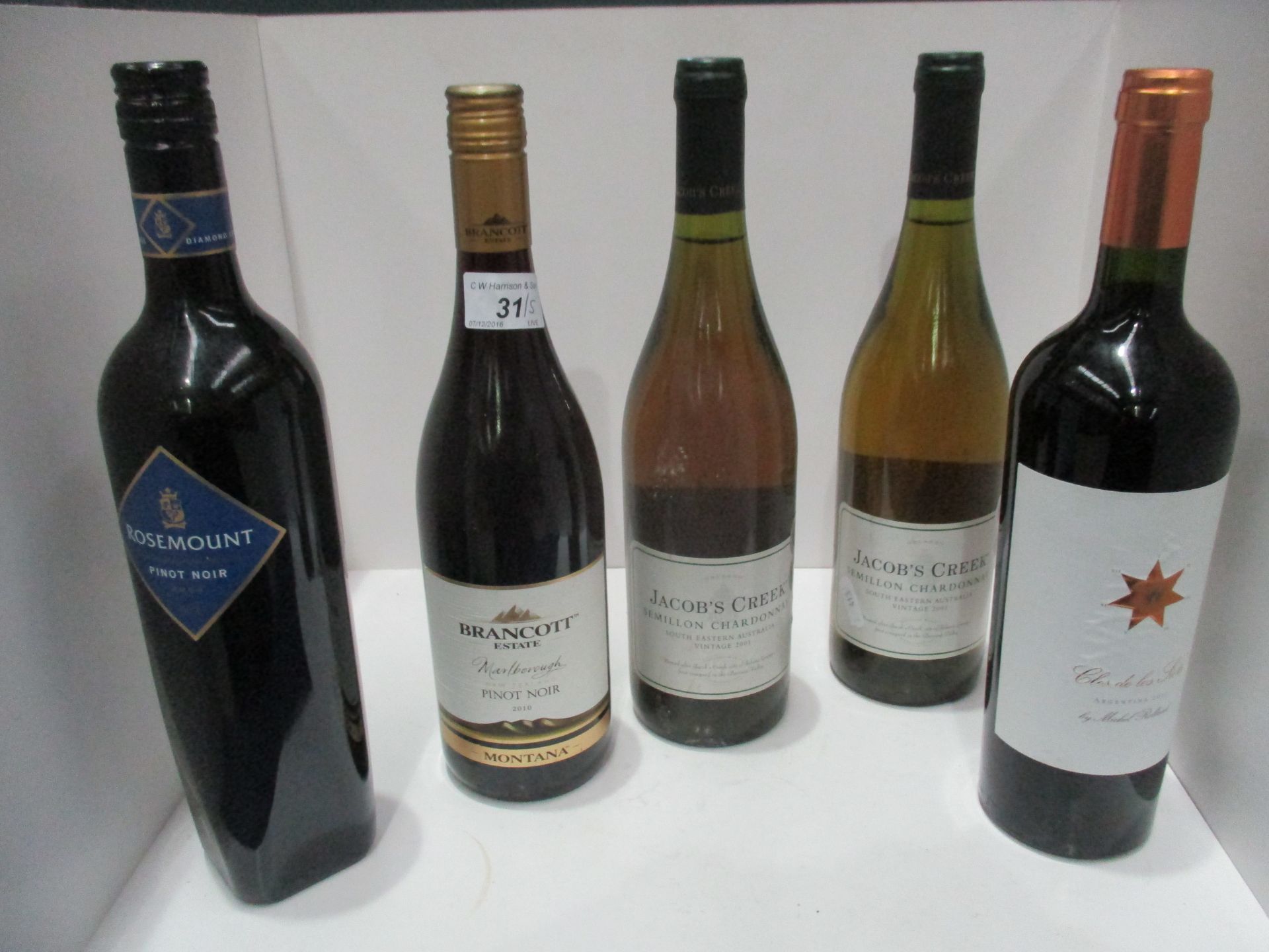 2 x 750ml bottles of Jacob's Creek Semillon Chardonnay, a 750ml bottle of Rosemount Pinot Noir, a