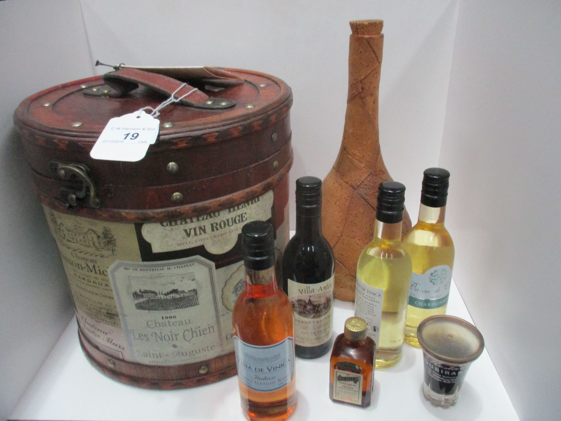 A Mr Giles Old World Wine drum, a cork covered bottle and 6 small bottles of wine and liqueurs