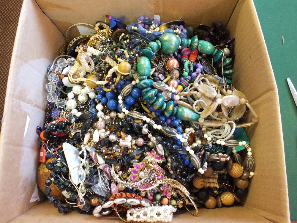 A box of various costume jewellery