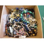 A box of various costume jewellery