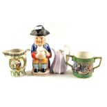 A 19th Century Polychrome Toby jug and three other pieces of china