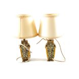 A pair of Brass reticulated table lamps