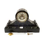 A black and variegated marble striking mantel clock