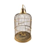 A circular Brass birdcage