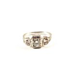 A Platinum continental Diamond Art Deco style ring,