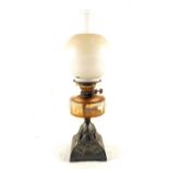 A cut glass iron base oil lamp