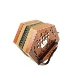 A Rosewood hexagonal accordion