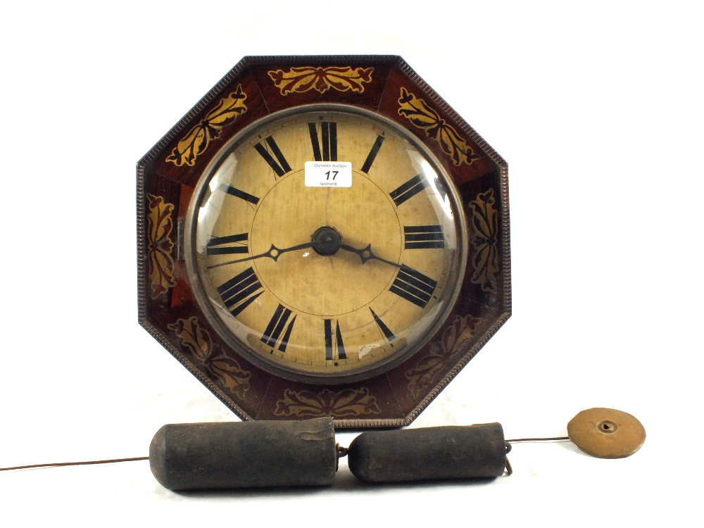 A 19th Century octagonal Rosewood wall clock with Brass inlays and bell