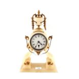 An alabaster and gilt metal mantel clock with urn finial