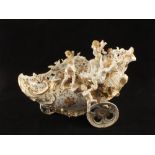 A continental porcelain cherub chariot bowl