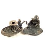 An Edwardian pewter chamberstick with lidded match container in the form of an owl and a Japanese