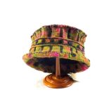 A treen wig stand and a hat