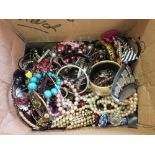 A box of various costume jewellery