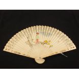 A boxed Japanese pierced and painted fan