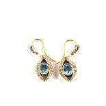 A large pair of Aquamarine and Diamond set drop earrings, each set with a Pearl,