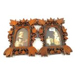 A pair of ornately carved Victorian wooden frames,