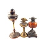 Three various oil lamps