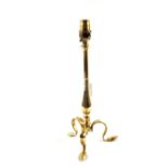 An Art Nouveau Pullman style Brass table lamp on three cabriole legs,