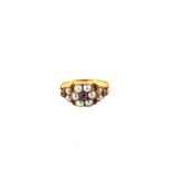 A Gold Pearl and Ruby set ring,