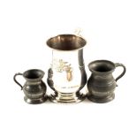 A Silver plated mug of local interest engraved 'The White Lion', Aldeburgh and two pewter measures,