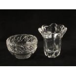 A Daum clear glass vase and a Tiffany & Co bowl with dolphin decoration,