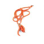 A Coral bead necklace with 9ct Gold clasp and three pieces of Coral mounted as pendants