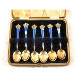 A cased set of Norwegian Silver and blue enamel coffee spoons (some damage)