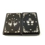 A pair of Japanese black lacquer and Mother of Pearl floral inlaid boxes