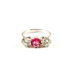 An 18ct White Gold three stone pink stone and Diamond set ring,