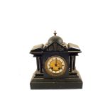 A black slate mantel clock