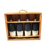 A presentation case of four bottles of Taylors Vintage Port, 10, 20,