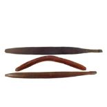 Three Aboriginal items to include a Boomerang and two Woomeras