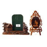 A Black Forest photo frame and a Sorrento inlaid wooden easel frame