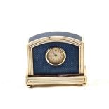 A Silver desk clock decorated with blue guilloche and white enamel