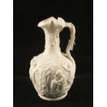 A Victorian Copeland Parian wine ewer with relief Baccalian scenes,