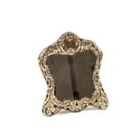 A shaped Silver mirror,