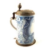 An 18th Century Delft type German cylindrical tankard painted with a Cardinal,