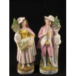 A pair of Victorian Staffordshire figurines,