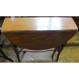 An Edwardian inlaid Mahogany oval Sutherland table with carved sides